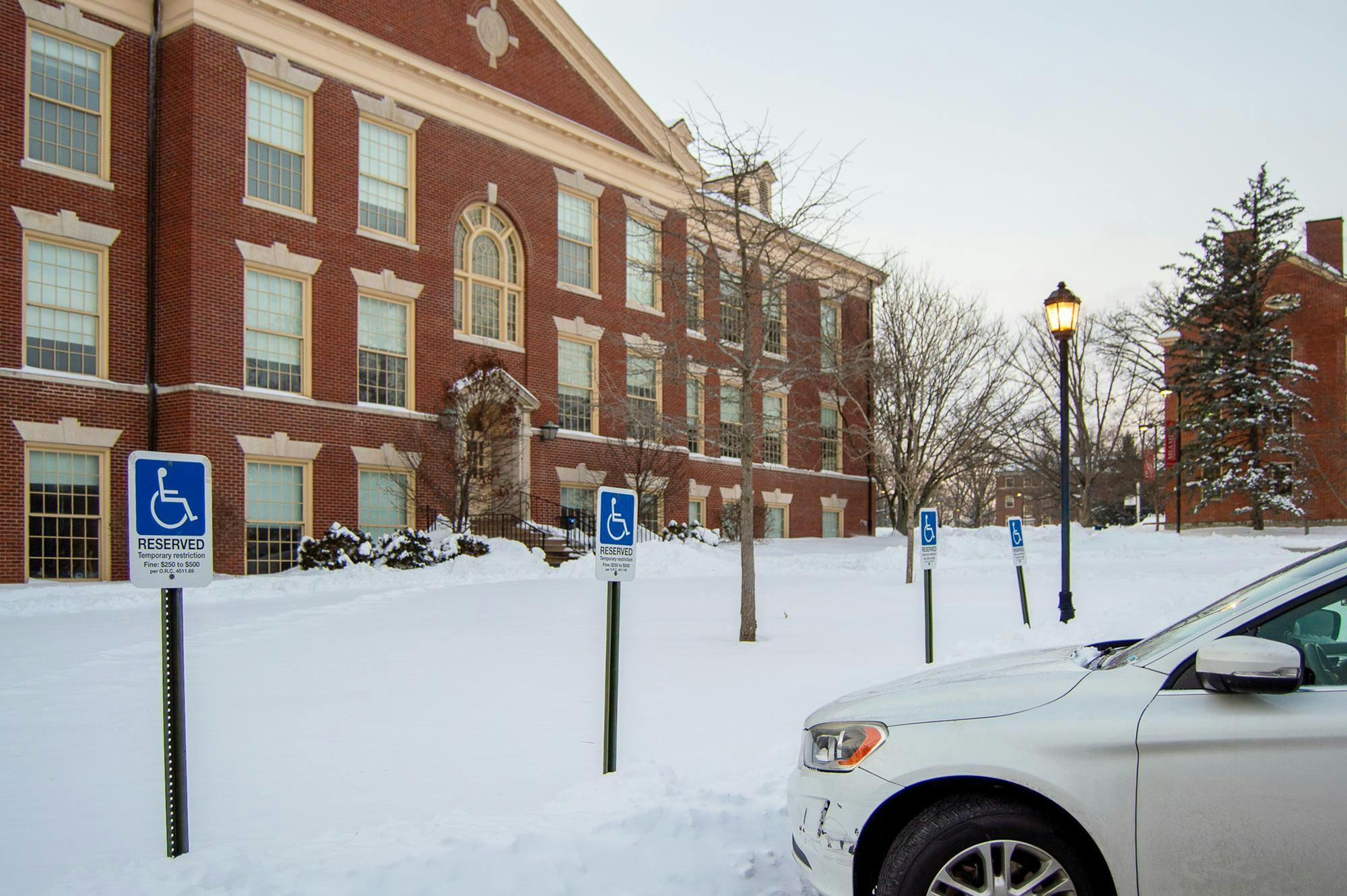 Elisa Rosenthal’s car parked in the handicap parking spots in front of Irvin Hall.