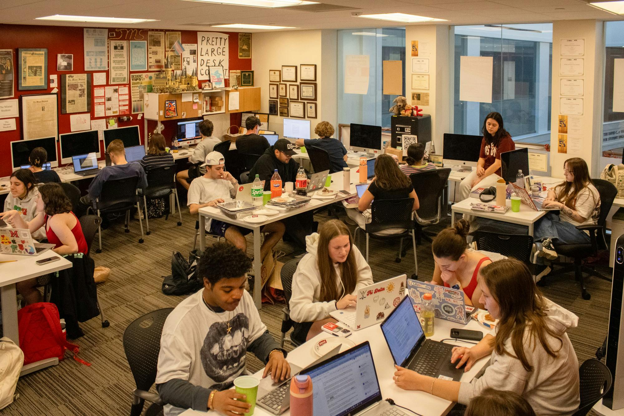 Editors and designers spend their Wednesday nights in the newsroom, where the newspaper gets made. ﻿