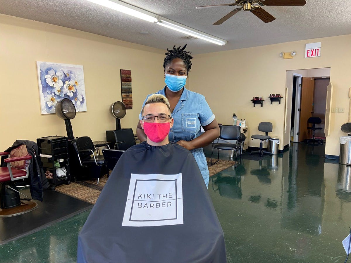 Kiki not only labors to provide quality cuts, she tries to connect with her customers as well. Photo by David Kwiatkowski. 