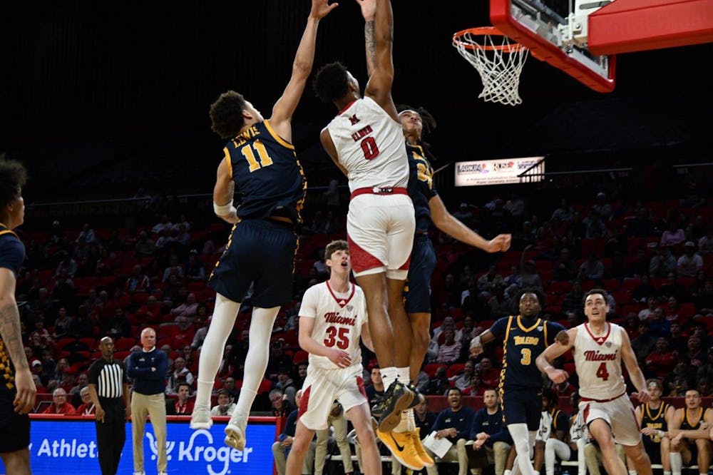 Sophomore wing Eian Elmer going for a dunk against the Rockets on Feb. 11 at Millett Hall