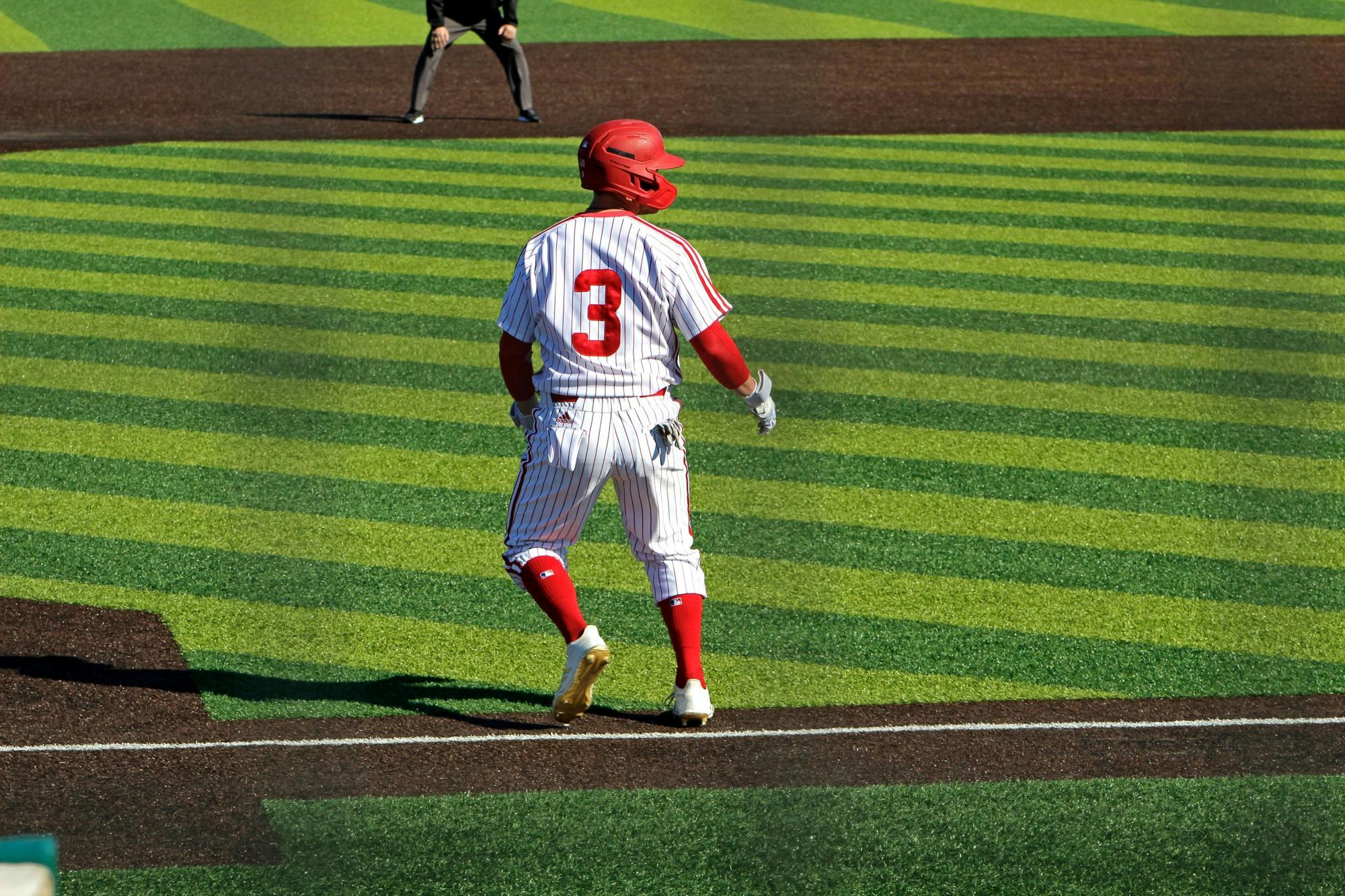 Charlie Harrigan inches off third base against Milwaukee. The RedHawks swept the series between March 7-8.