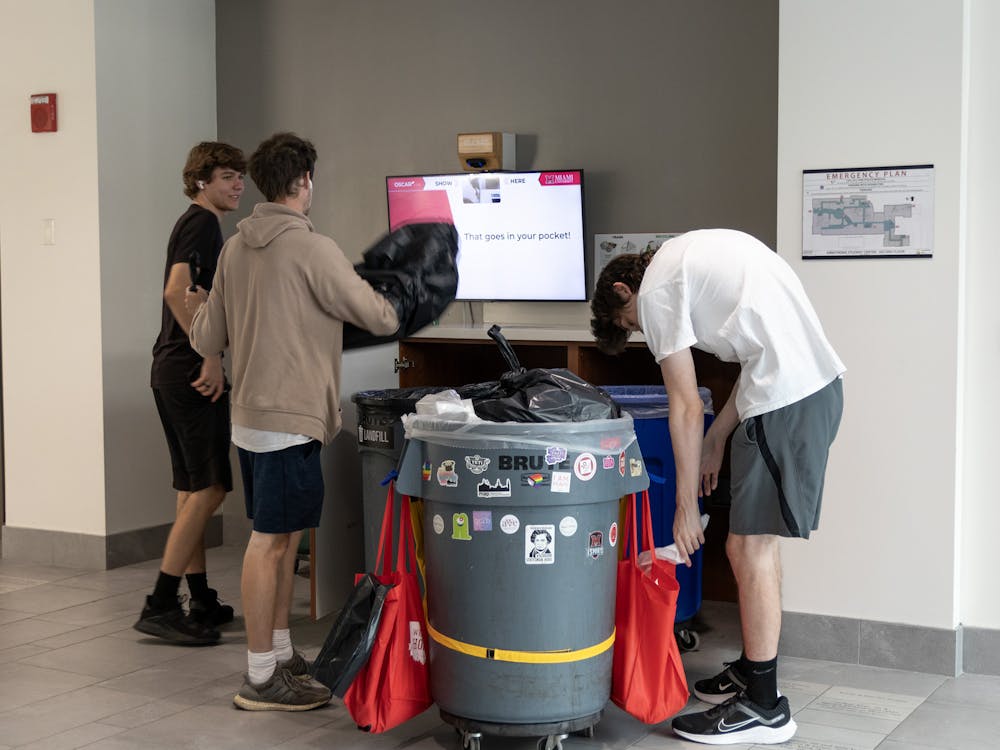 Along with disposing of their waste, students have the opportunity to assist in emptying the contents of the bins.