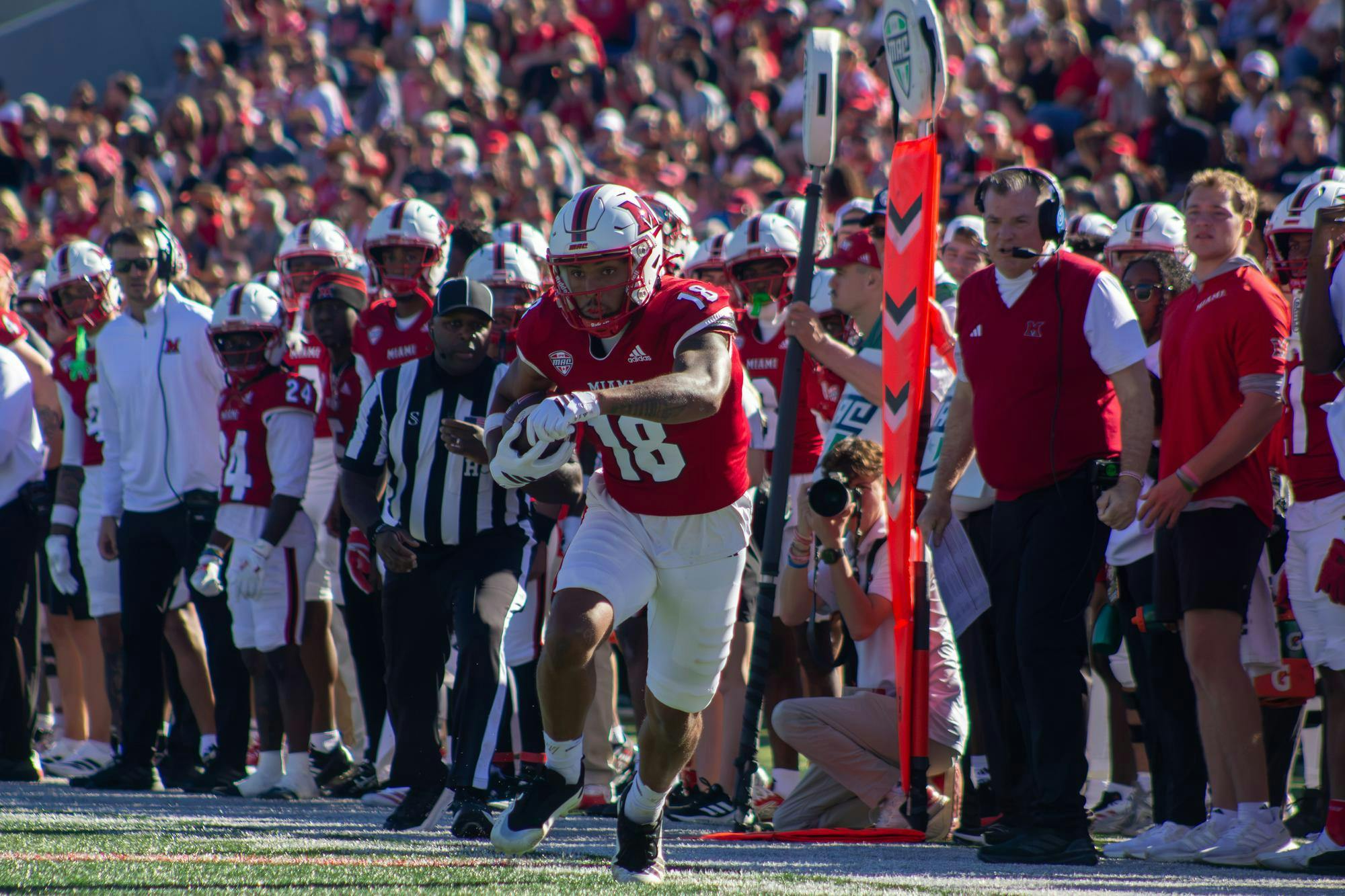 Redshirt-sophomore wide receiver Braylon Isom runs with the ball in game against UConn.