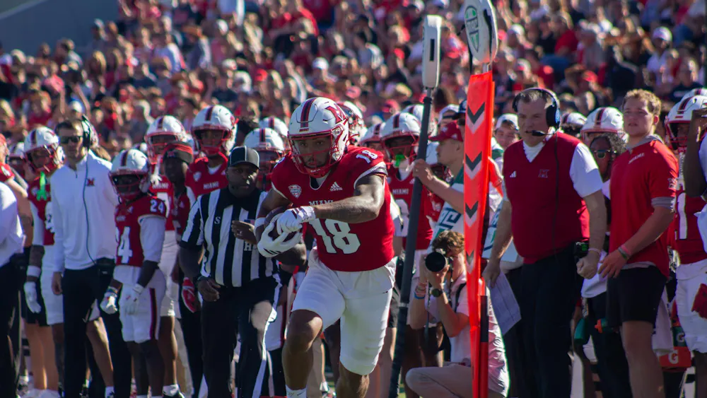 Redshirt-sophomore wide receiver Braylon Isom runs with the ball in game against UConn.