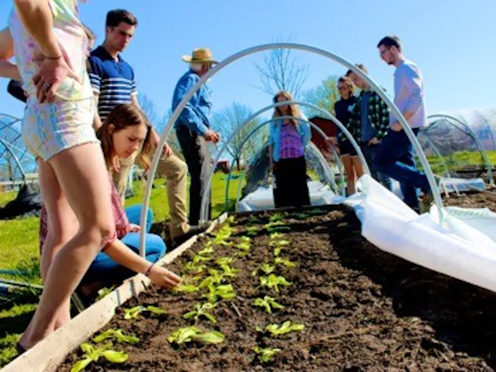 Students planting crops in April | Photo by Carder Gilbert