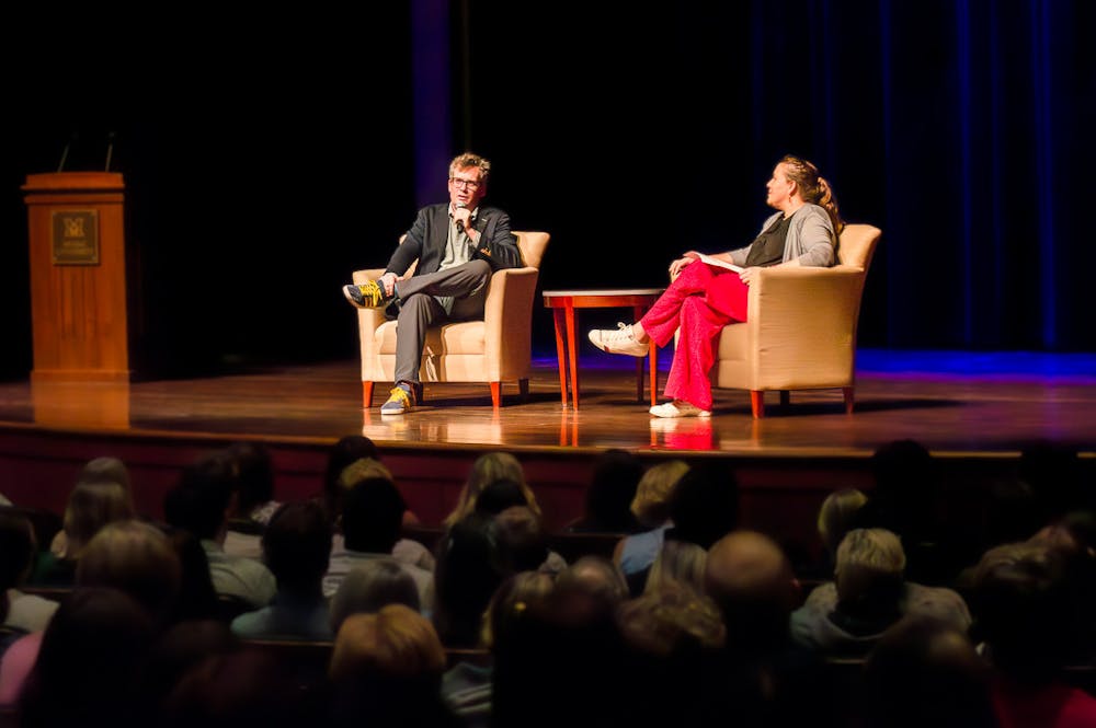 Staff Writer Josie Zimmerman got to meet author John Green (left) and present him with fan-art.