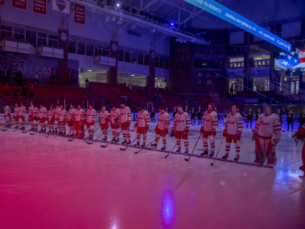 The Miami RedHawks stand at center ice for the Star Spangled Banner before a Feb. 12 contest against St. Cloud State.