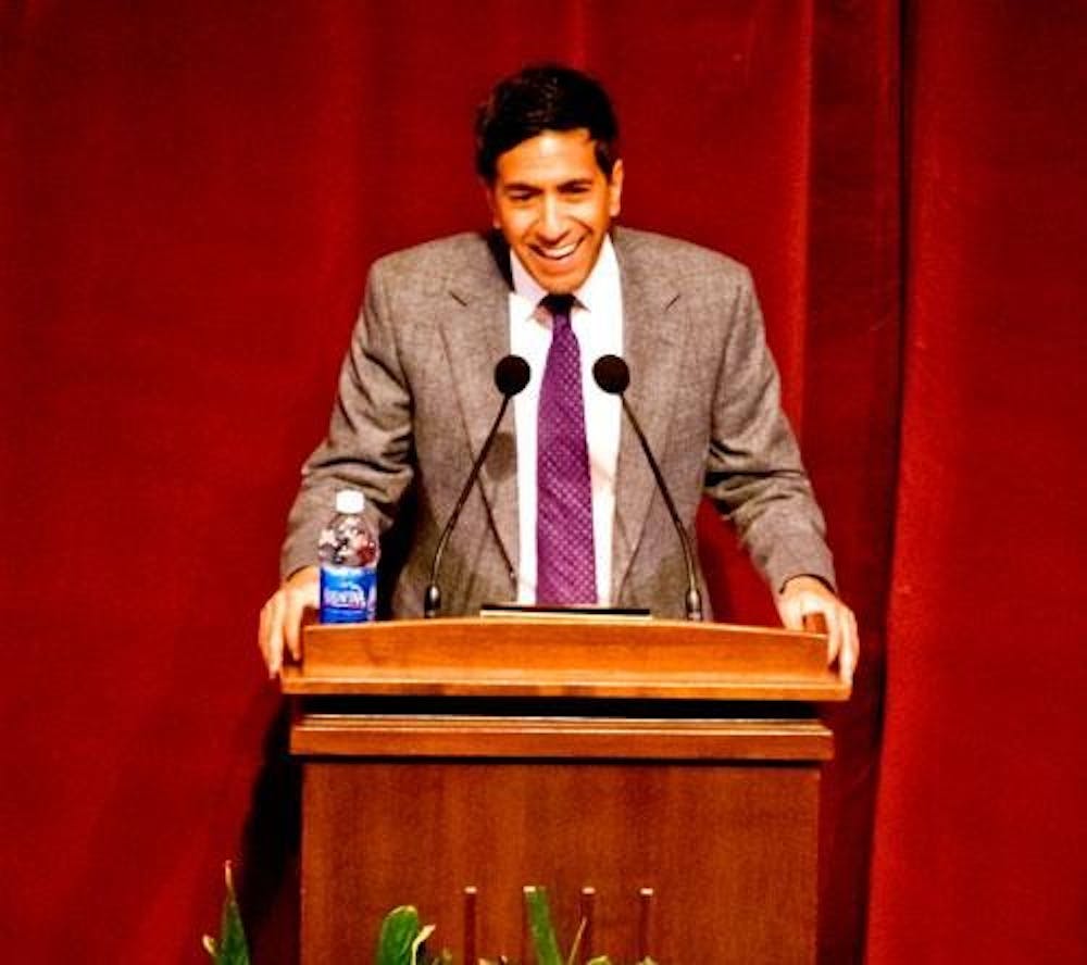 Dr. Sanjay Gupta, chief medical correspondent for CNN, speaks to a full Hall Auditorium Monday night. Gupta is a neurosurgeon who still practices medicine and performs surgery despite his duties at CNN. Gupta’s lecture focused on health care and medicine and how they are practiced around the world. He also talked about how medical stories are reported on television.