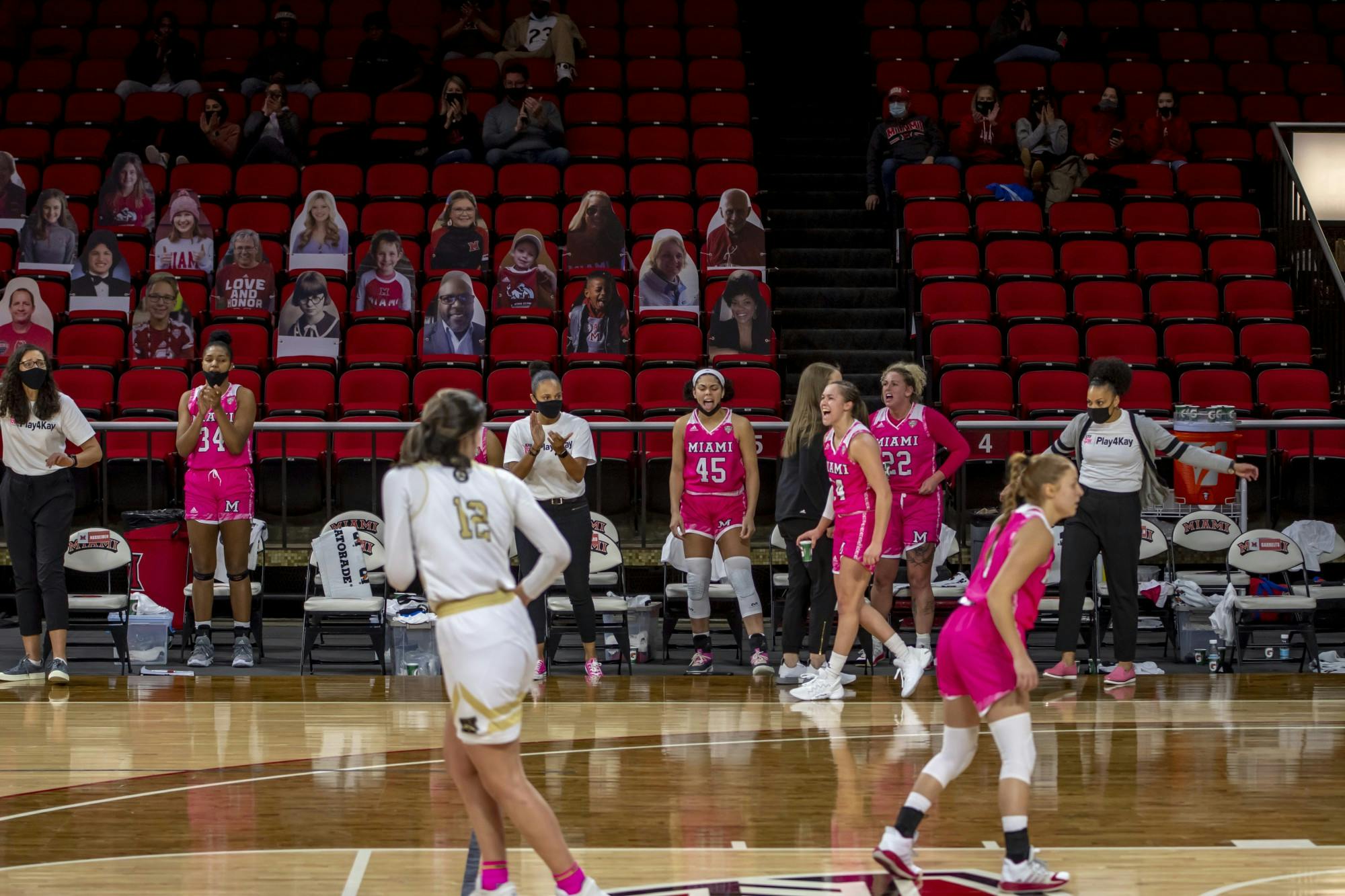 Miami&#x27;s bench celebrates during a 2021 contest vs. Akron.