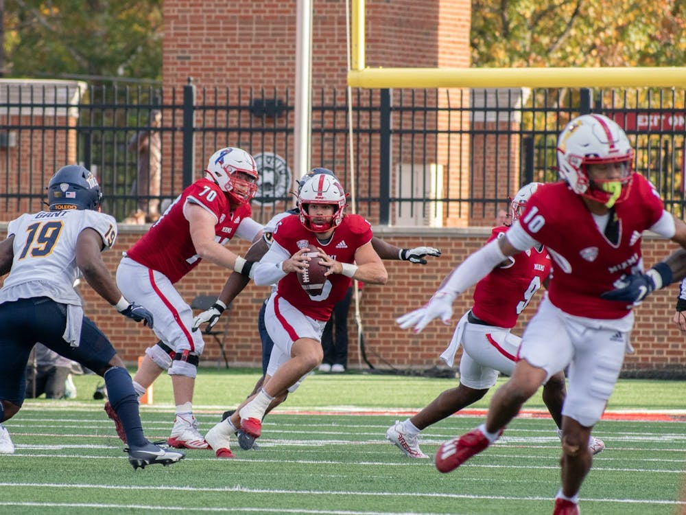 Star junior quarterback Brett Gabbert rushes shortly after the snap against the University of Toledo.