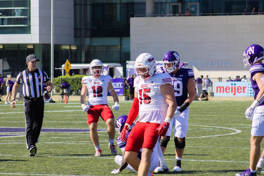 RedHawk linebacker Matt Salopek celebrates after a tackle in the second quarter of Miami’s game against Northwestern.