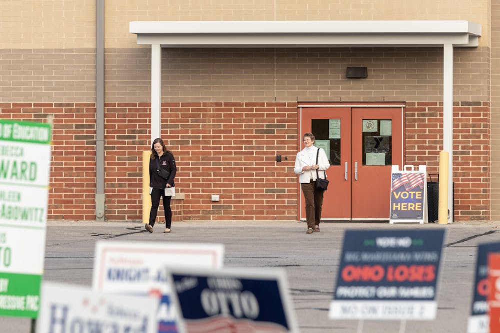 Voters show up to Kramer Elementary School﻿, one of the three polling locations, to vote on items such as Oxford City Council seats and Issues 1 and 2.