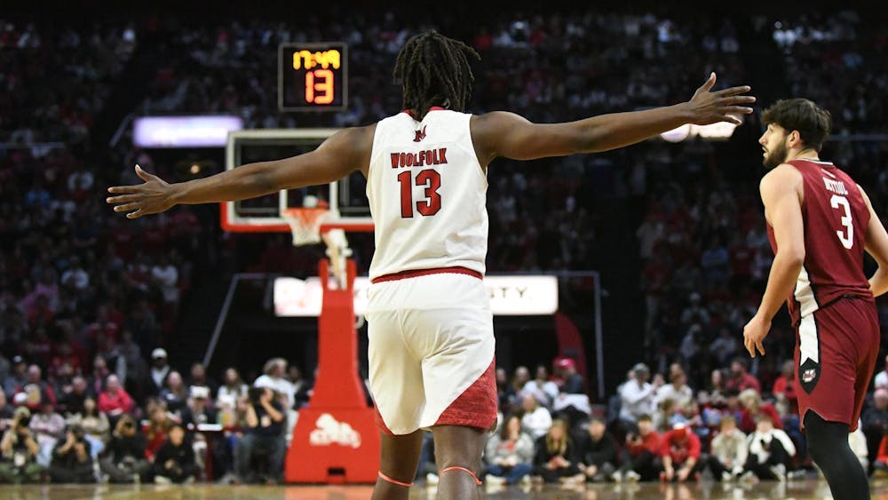 Senior forward Antwone Woolfolk prepares for the UMass defense at Millett Hall on Jan. 27