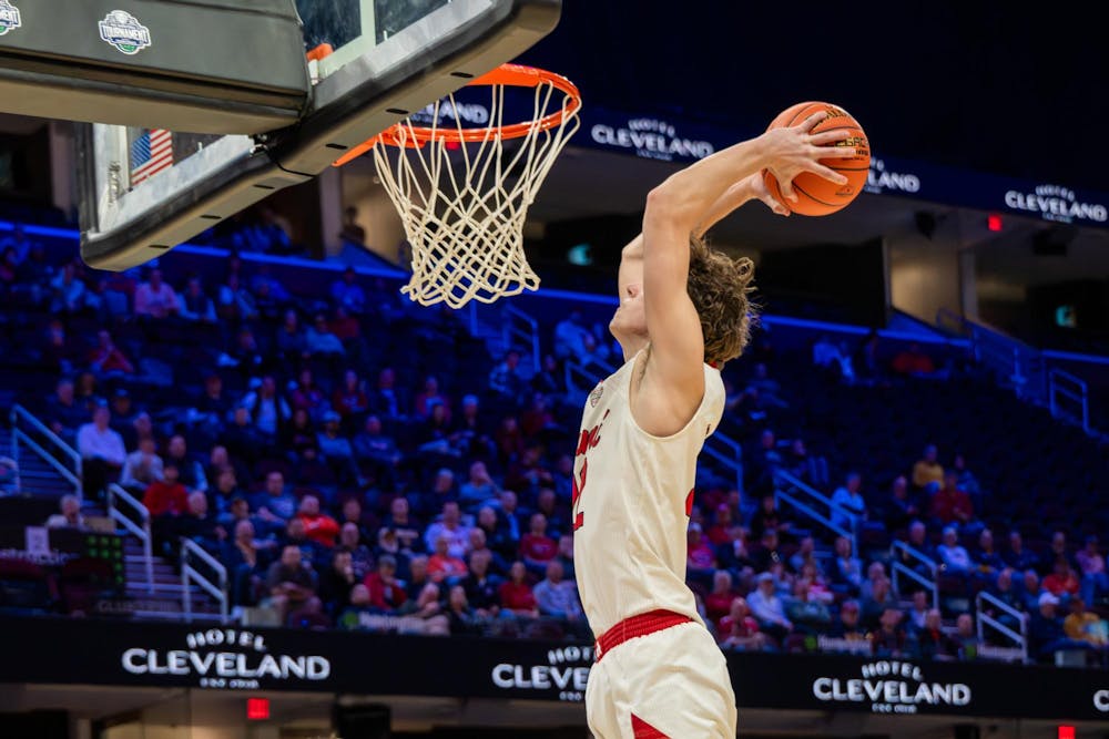 <p>Redshirt sophomore wing Brant Byers makes a dunk in the last half of the game.</p>