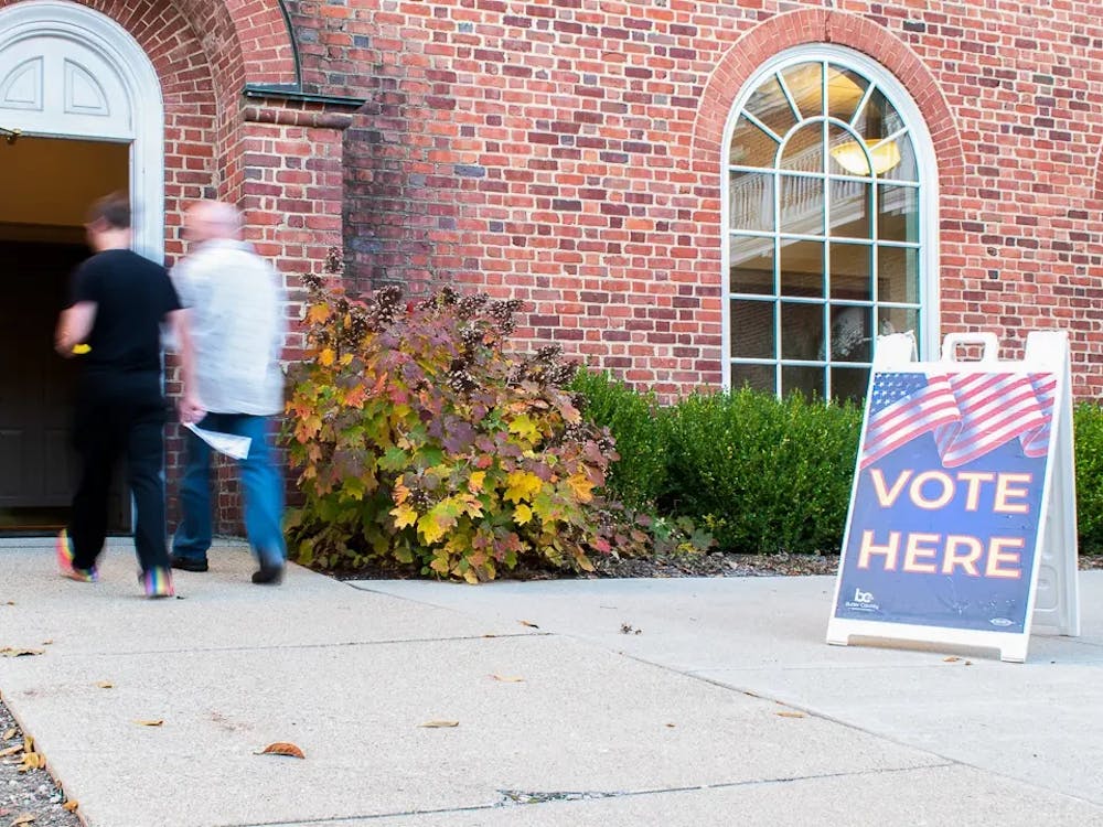 Voters head into the Marcum hotel to cast their ballots on Election Day.
