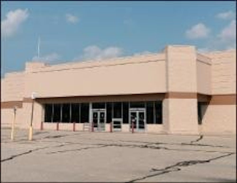 Planning for the old Wal-Mart building has been on hold since 2007 after a real estate developing firm stopped work on its proposal.
