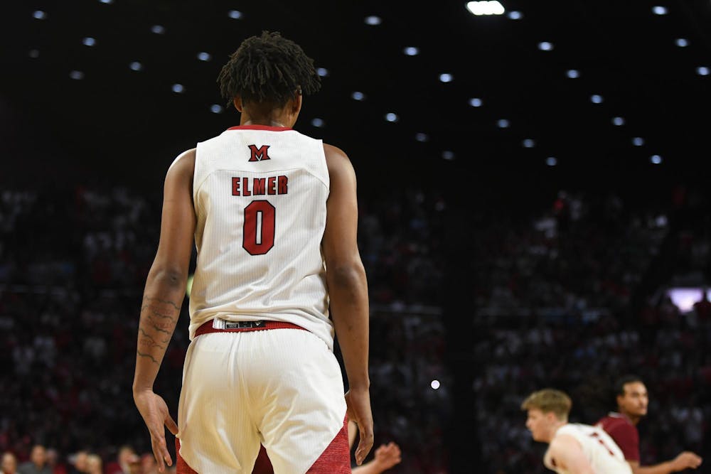 Junior wing Eian Elmer stands at Millett Hall during the UMass game on Jan. 27