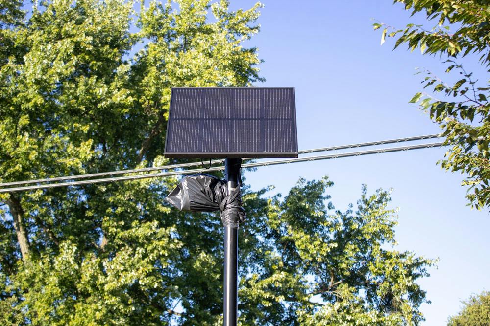 Flock camera covered with black plastic to block use