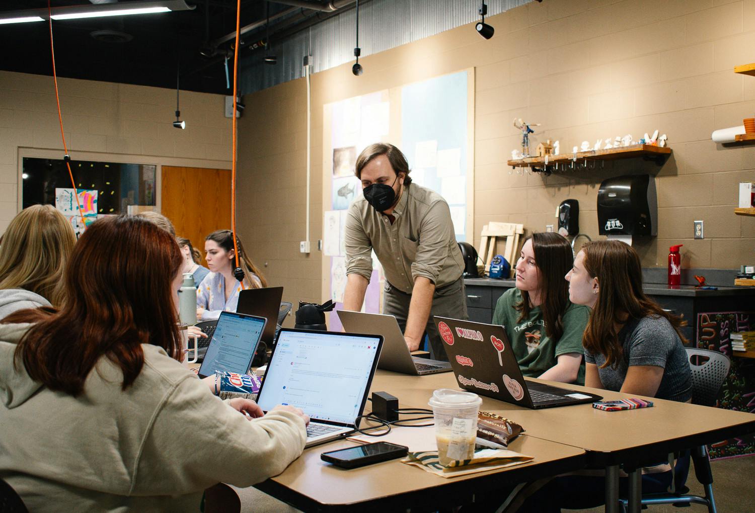 Dr. Luke Meekan assists his students with creating lesson plans during ART 295, “Elementary Art Methods.”