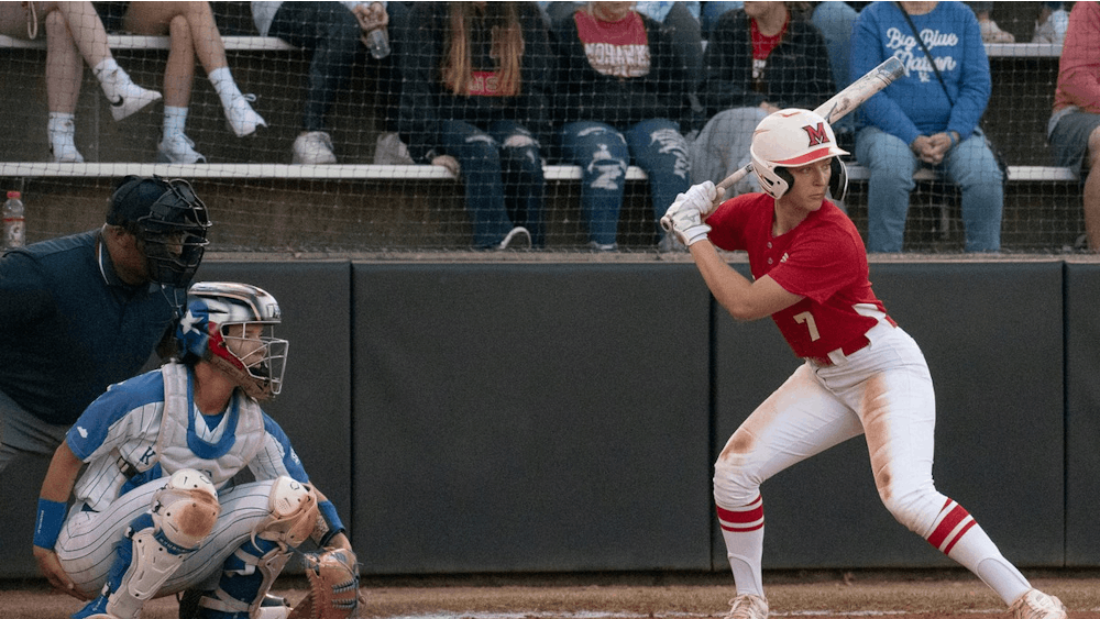 Miami star infielder Karli Spaid waits for a pitch against the University of Kentucky