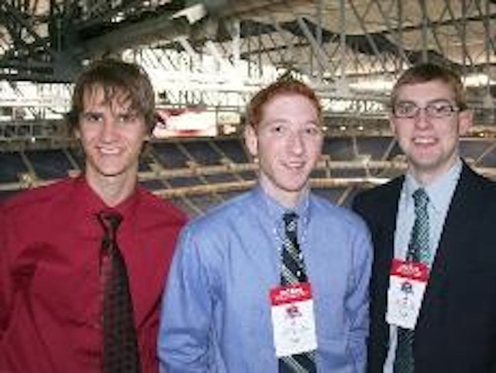 Hunter Olson, Mike Cohen and Patrick Murray say they strive to make the sports division at WMSR more professional.