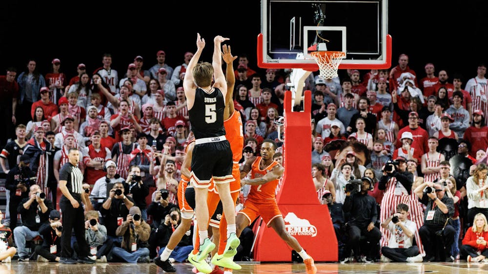 Senior guard Peter Suder takes a shot at Millett Hall against Bowling Green on Feb. 20