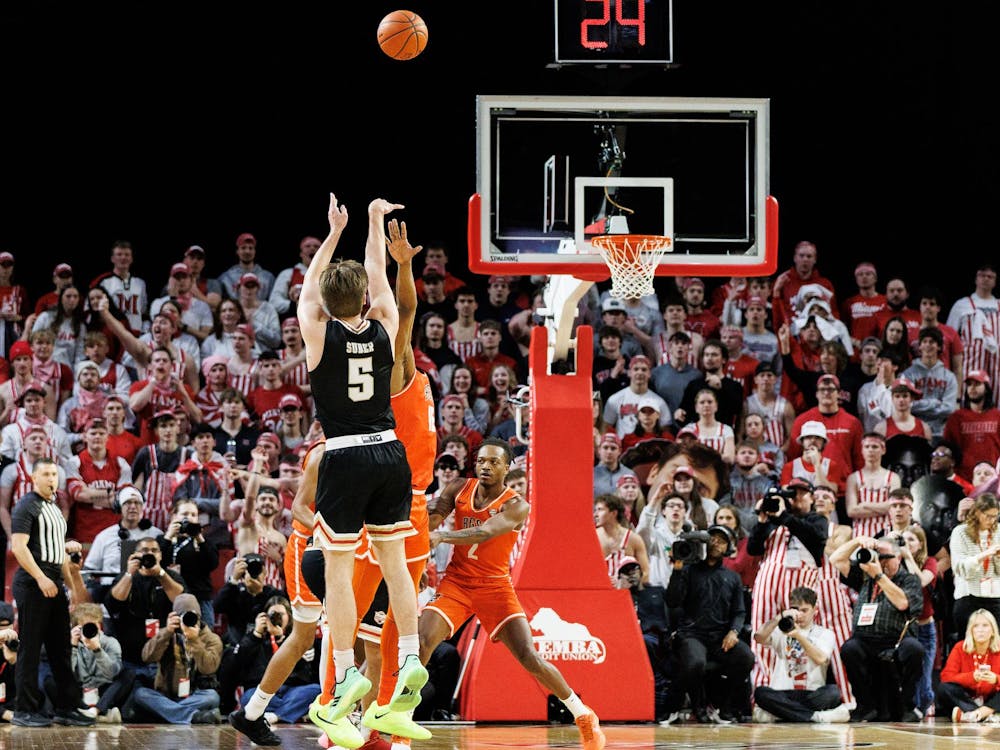 Senior guard Peter Suder takes a shot at Millett Hall against Bowling Green on Feb. 20
