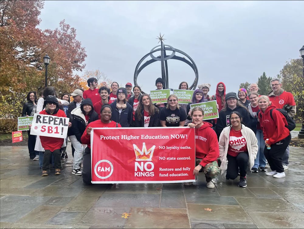 Miami University students and faculty gathered to protest the Compact for Academic Excellence in Higher Education on Friday, Nov. 7.
