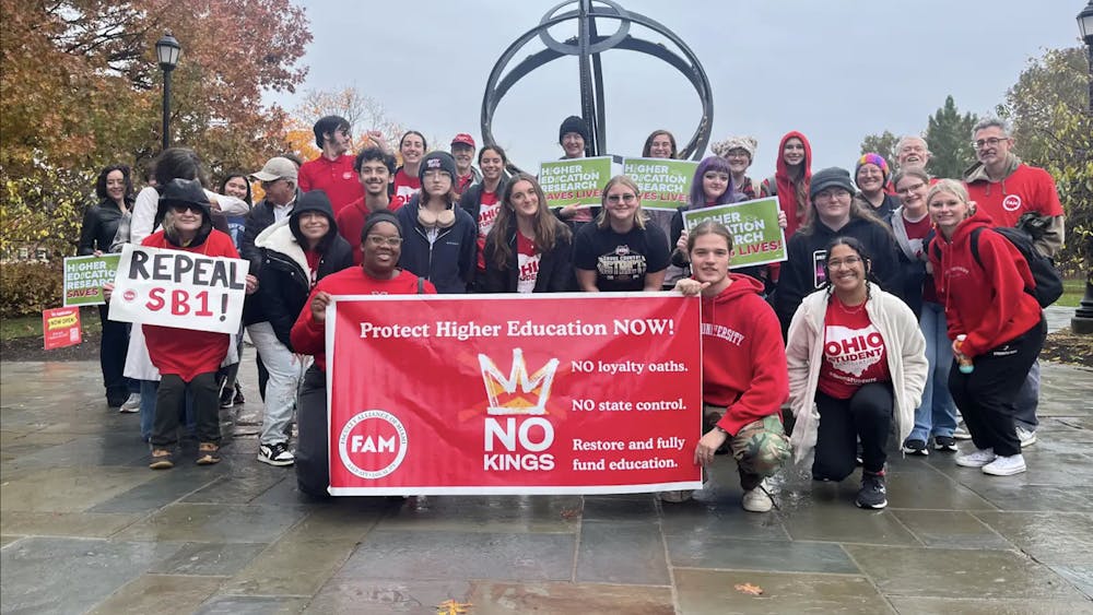 Miami University students and faculty gathered to protest the Compact for Academic Excellence in Higher Education on Friday, Nov. 7.