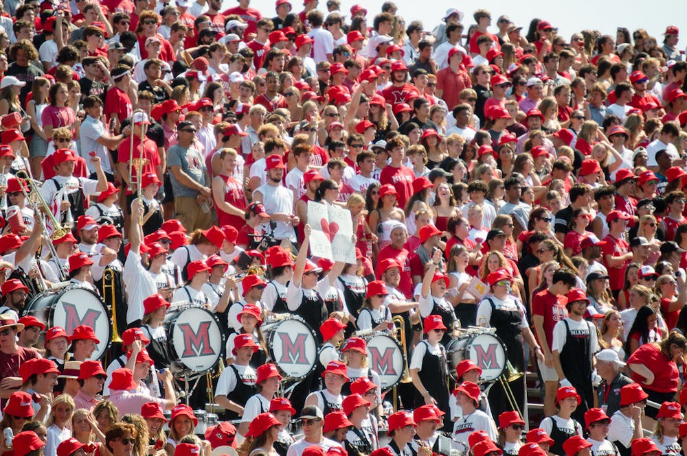 Students cheer on Miami’s football team in the Victory Bell game against University of Cincinnati