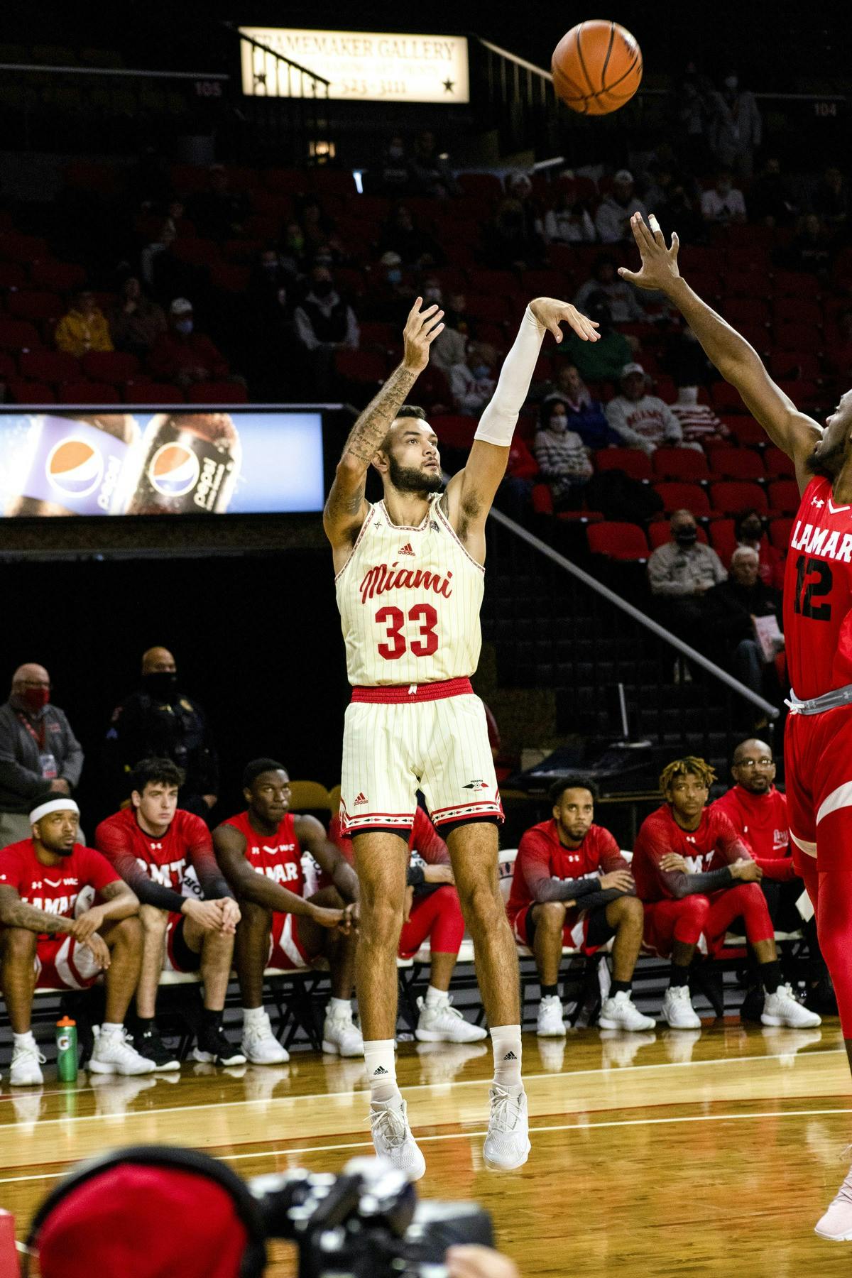 Senior forward Eli McNamara shoots a jump shot in a Nov. 13 contest vs. Lamar. The RedHawks beat the Cardinals 104-75