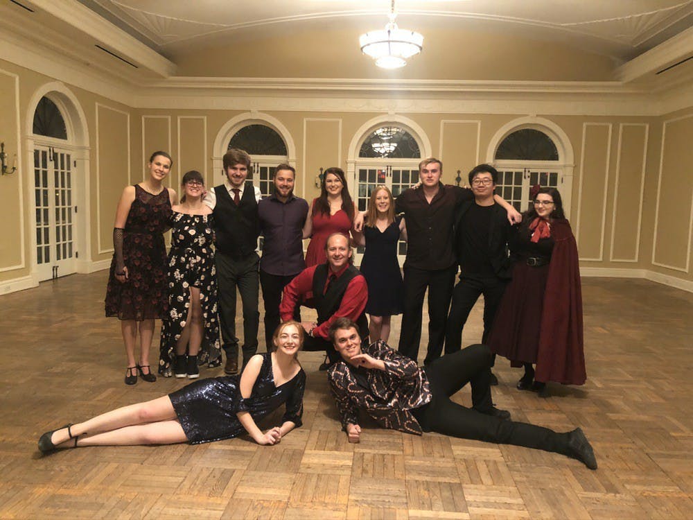 Visiting faculty member Michael Scoggins (center), who has been teaching two-credit-hour social dance classes at Miami for 17 years is losing his job due to budget cuts across the university. A group of his undergraduate assistants (UAs) have made a separate petition to reinstate him. 