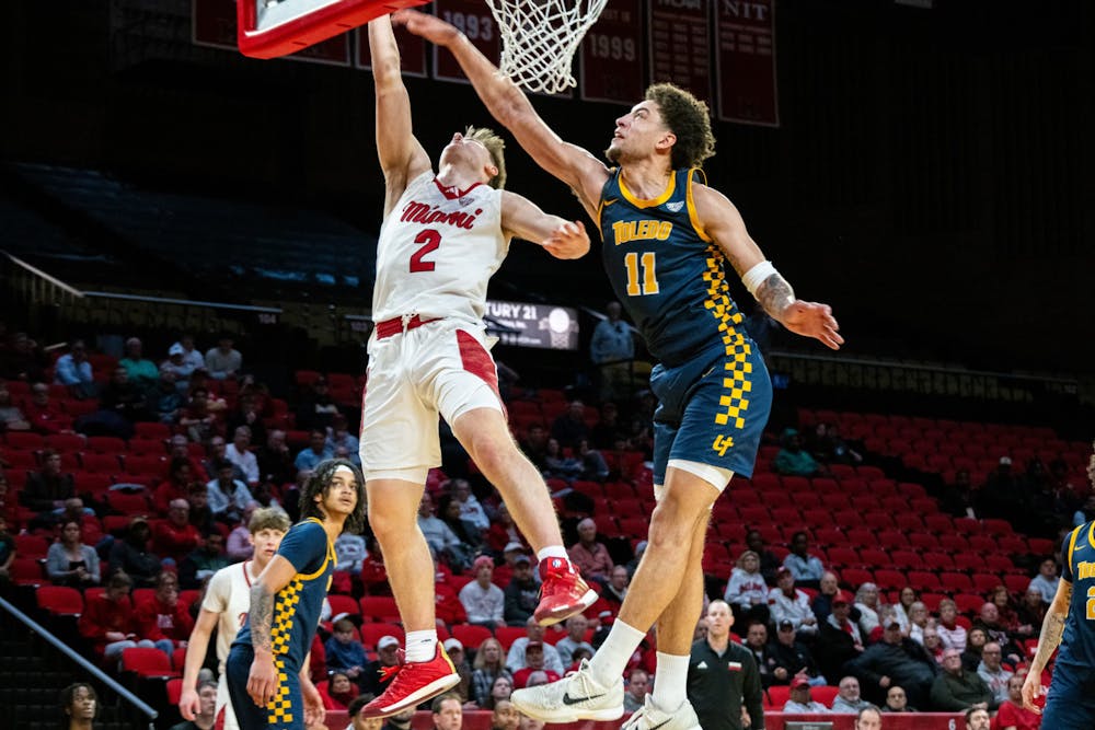 Sophomore guard Evan Ipsaro going for a layup against Toledo on Feb. 11 at Millett Hall