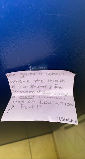 Talawanda High School students stuck post-it notes around the school to protest the dress code.