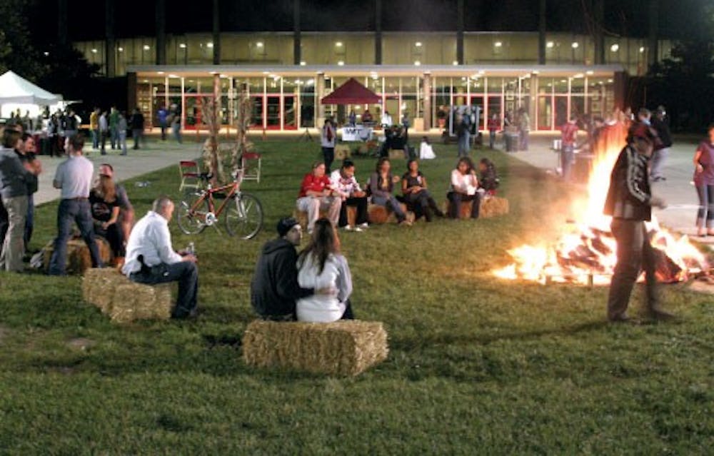 Miami University students celebrate Homecoming 2009 with a bonfire at Millett Hall. This year, Homecoming events will be different from the past.