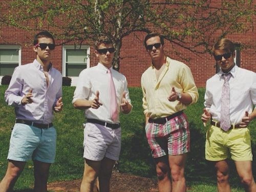 Four college students in preppy-wear. Photo by William frank on Pinterest.