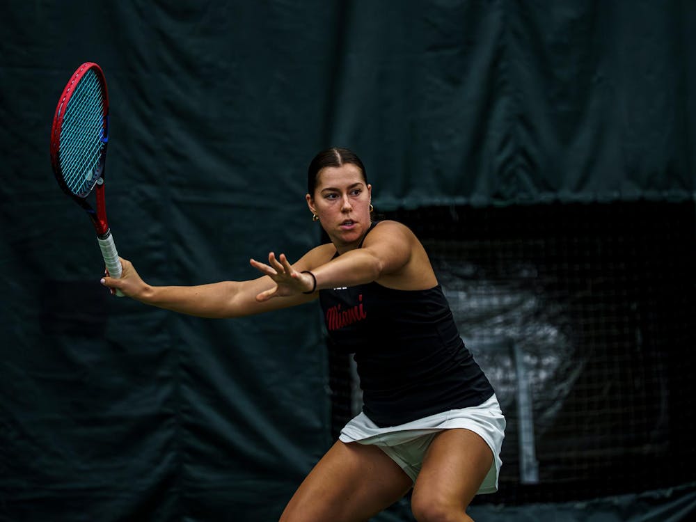 Freshman Maria Komar prepares to return a shot against Butler at Riverside Athletic Club on Feb. 15