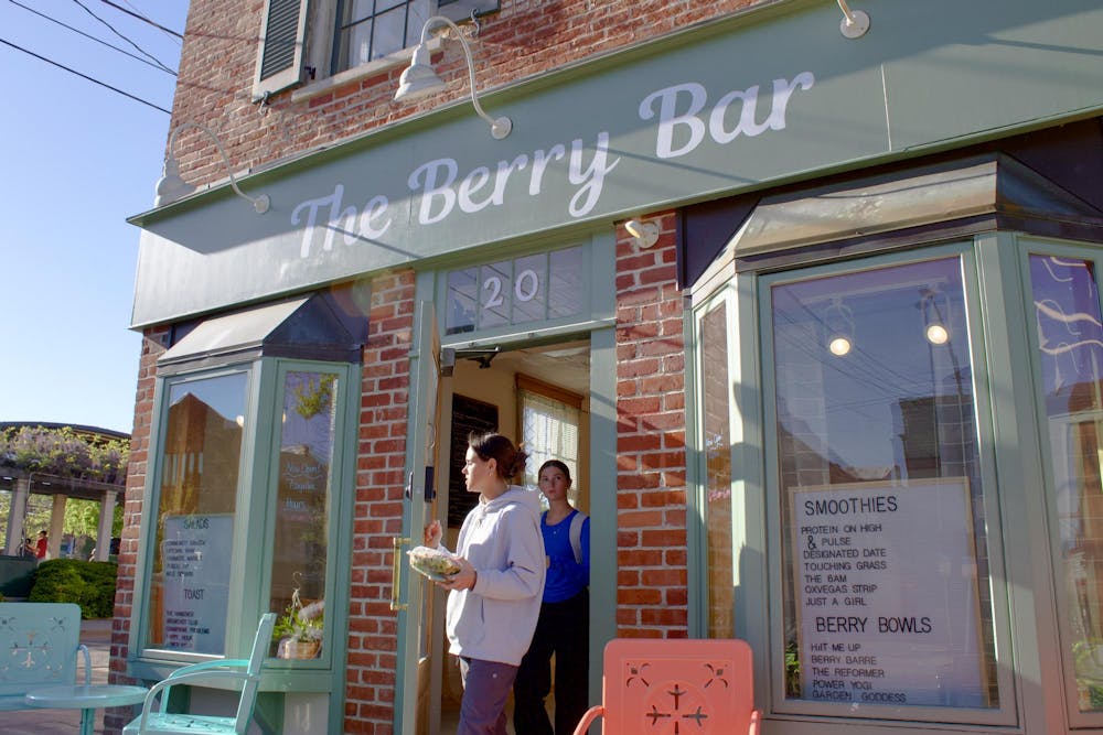 <p>Workers exit The Berry Bar located at 20 E High St. in Oxford, Ohio.</p>