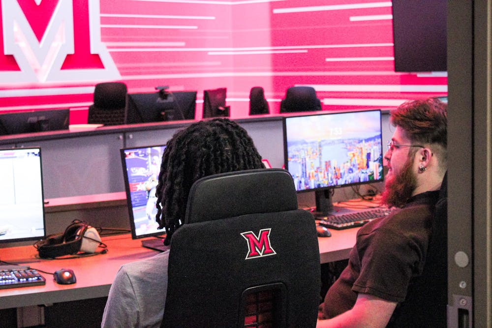 <p>Members of the esports team practice</p>