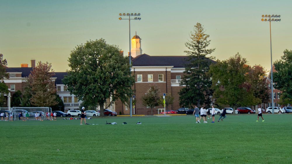 Students using Cook Field for intramural sports practices.