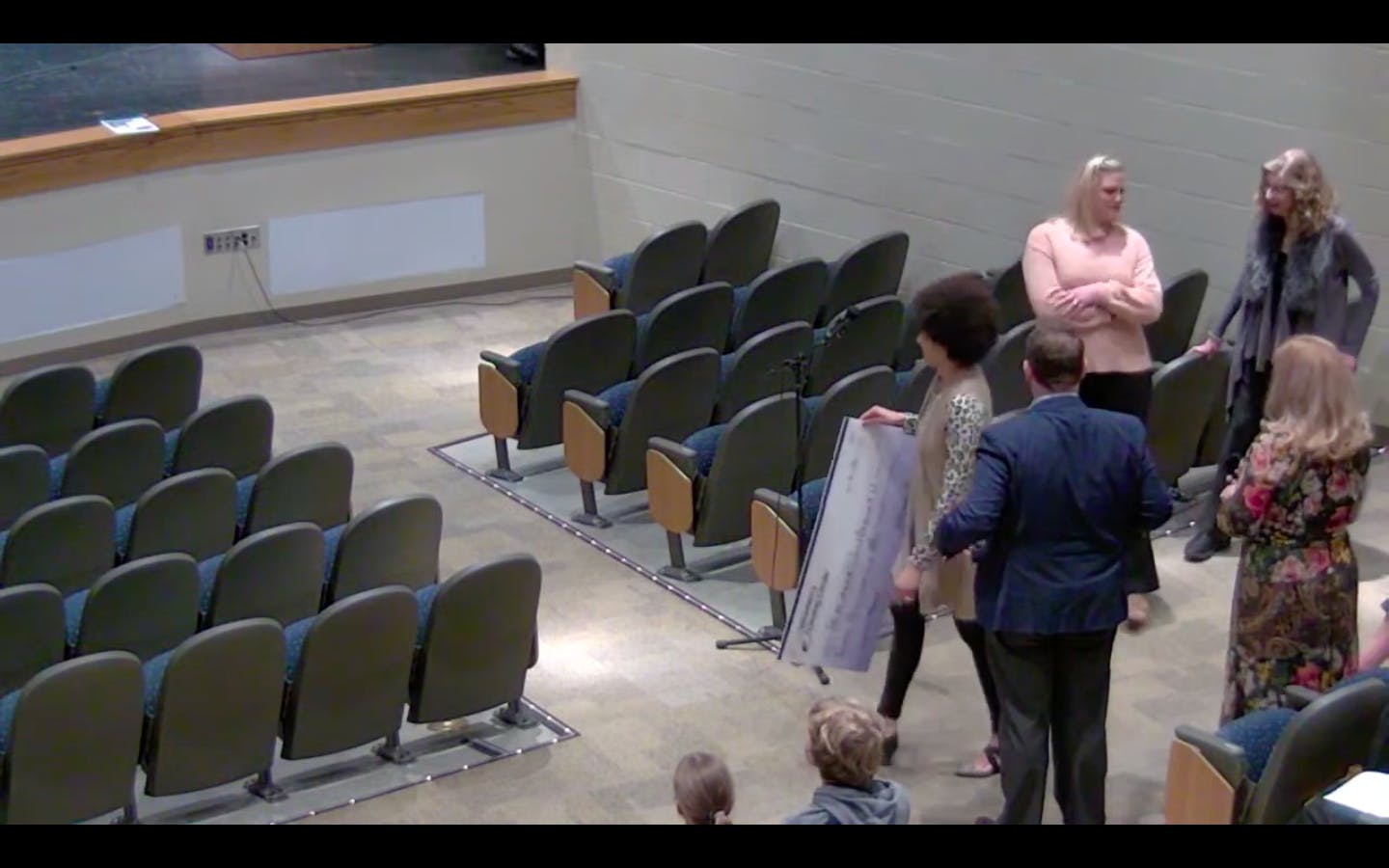 
Mary Bennett, chief development officer of the McCullough-Hyde Foundation,  presented a large check to the Talawanda School Board to help alleviate student lunch debt.