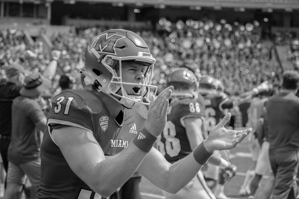<p>Dom Dzioban celebrates on the field at Yager Stadium.</p>