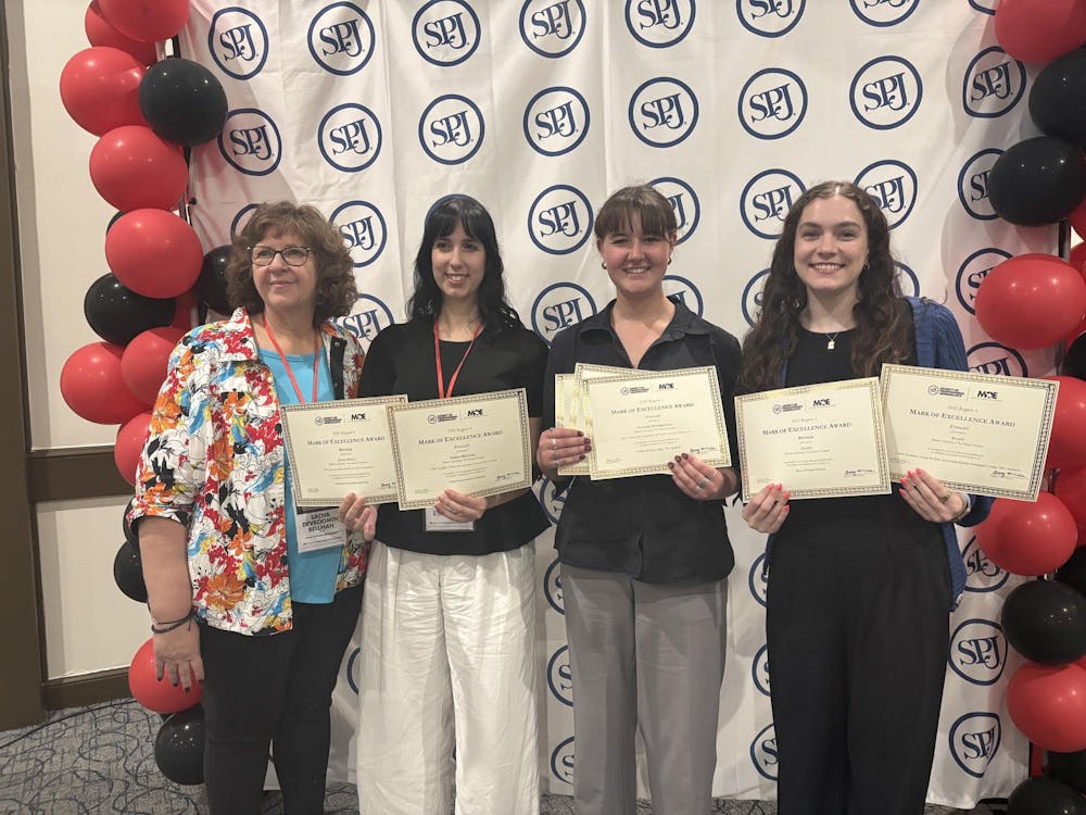 From left to right, Sacha Bellman, Sarah Kennel, Shannon Mahoney and Elisa Rosenthal accept awards for TMS.