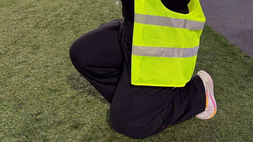 Sarah Frosch photographs the 2025 Snoop Dogg Arizona Bowl game in Tucson, Arizona.