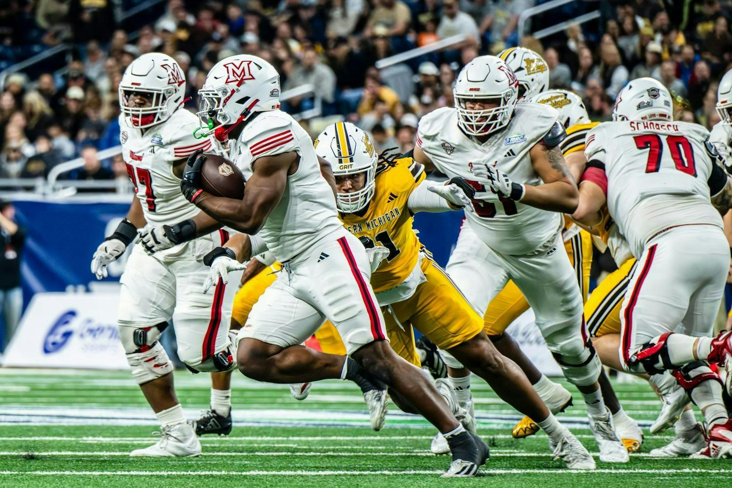 Redshirt senior running back Jordan Brunson takes the ball for a rush against Western Michigan at the MAC championship on Dec. 6 at Ford Field