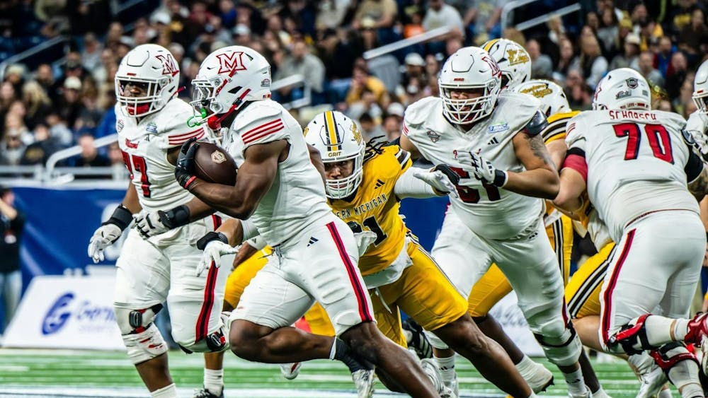Redshirt senior running back Jordan Brunson takes the ball for a rush against Western Michigan at the MAC championship on Dec. 6 at Ford Field