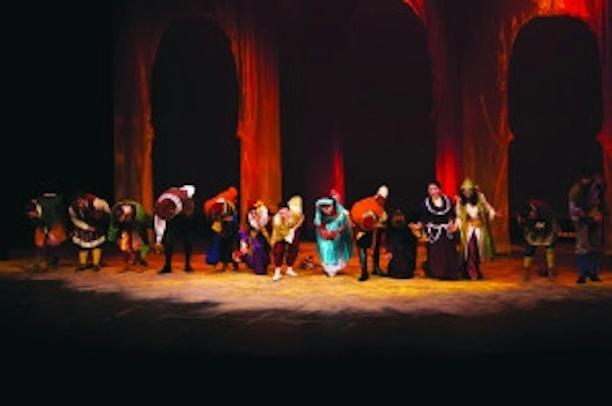 The cast of The Comedy of Errors takes a bow at curtain call after their first performance together Thursday night.