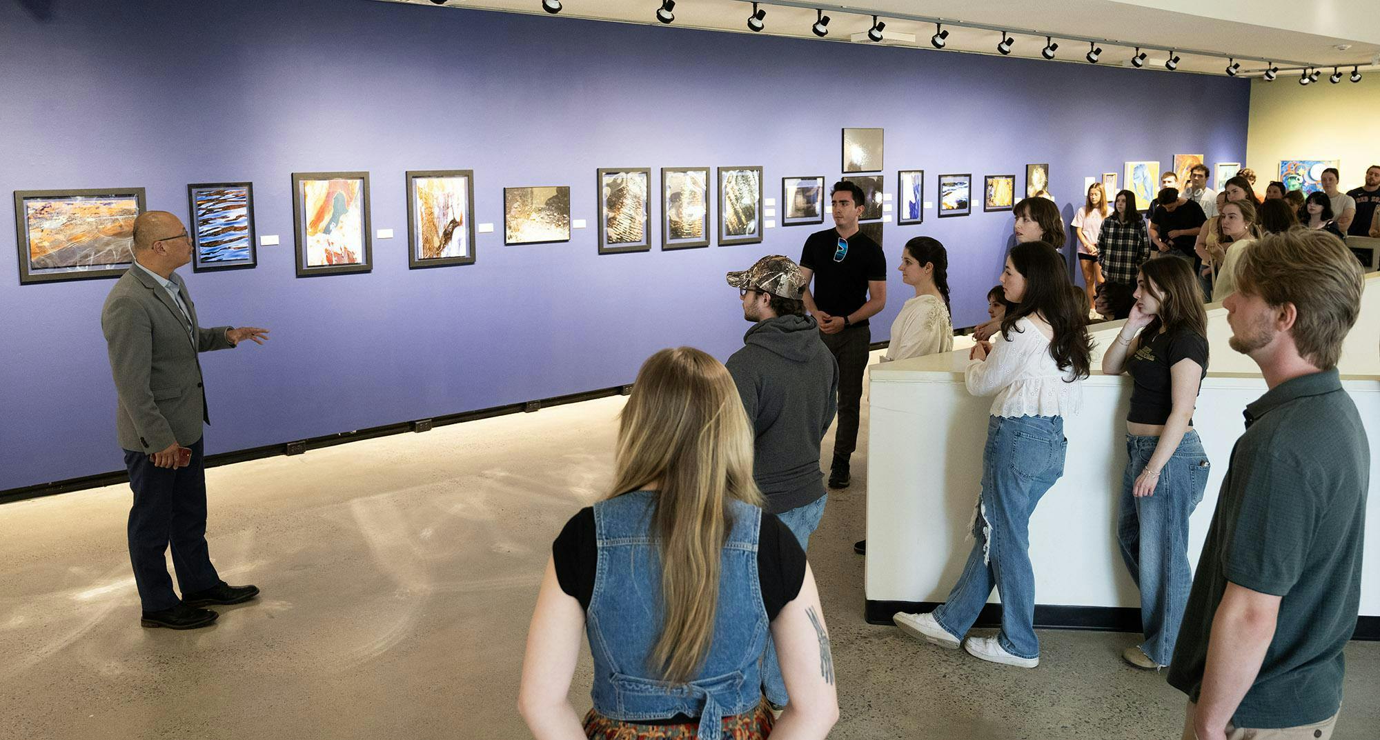 Cariens Speaking to Audience at URC Reception - Photo Credit Otto Luna.jpg