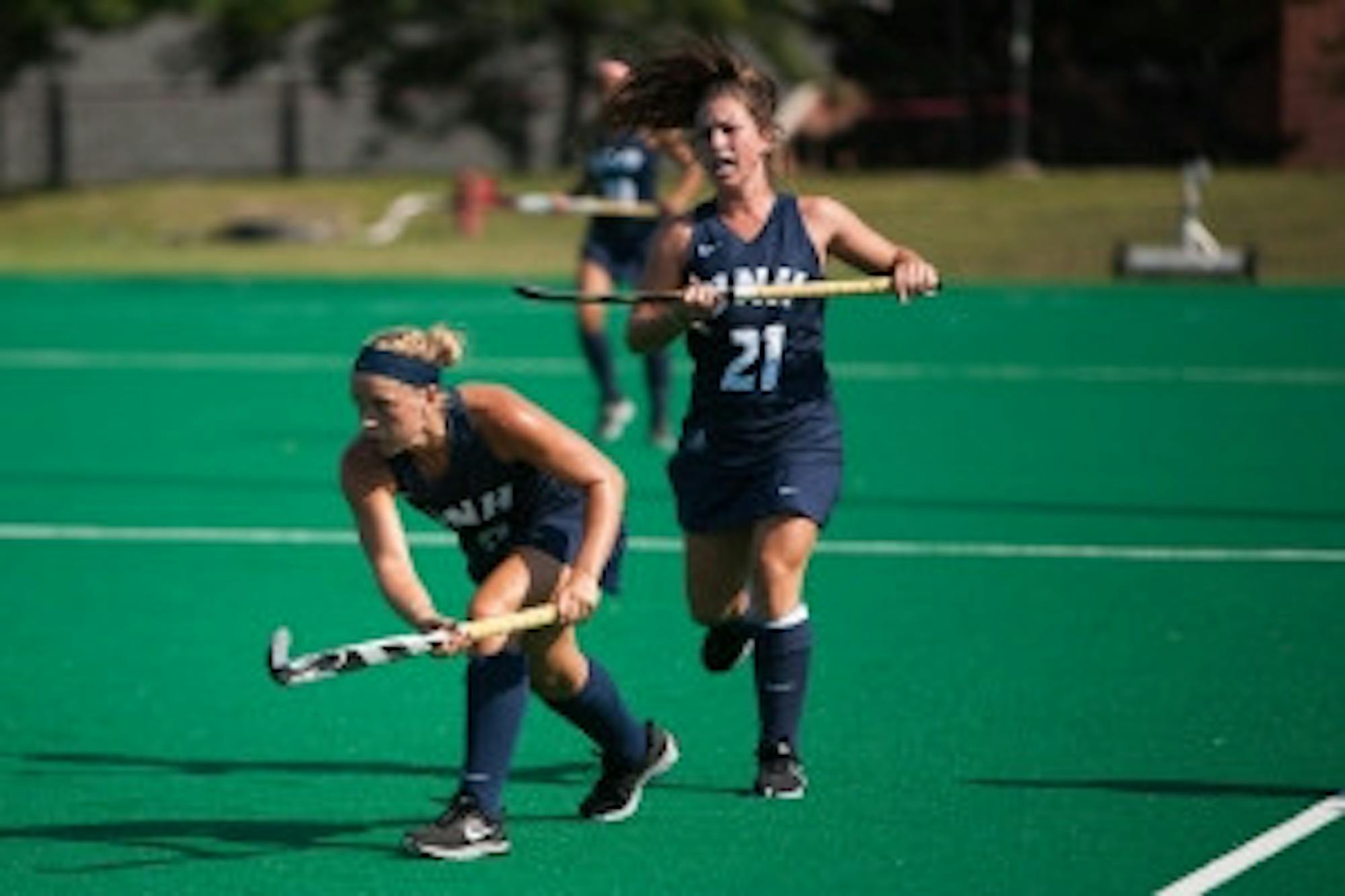 Cameron  Johnson/STAFF Aggie Sutherland (6) and Emma Compagna (21) follow the ball downfield against Drexel last week.