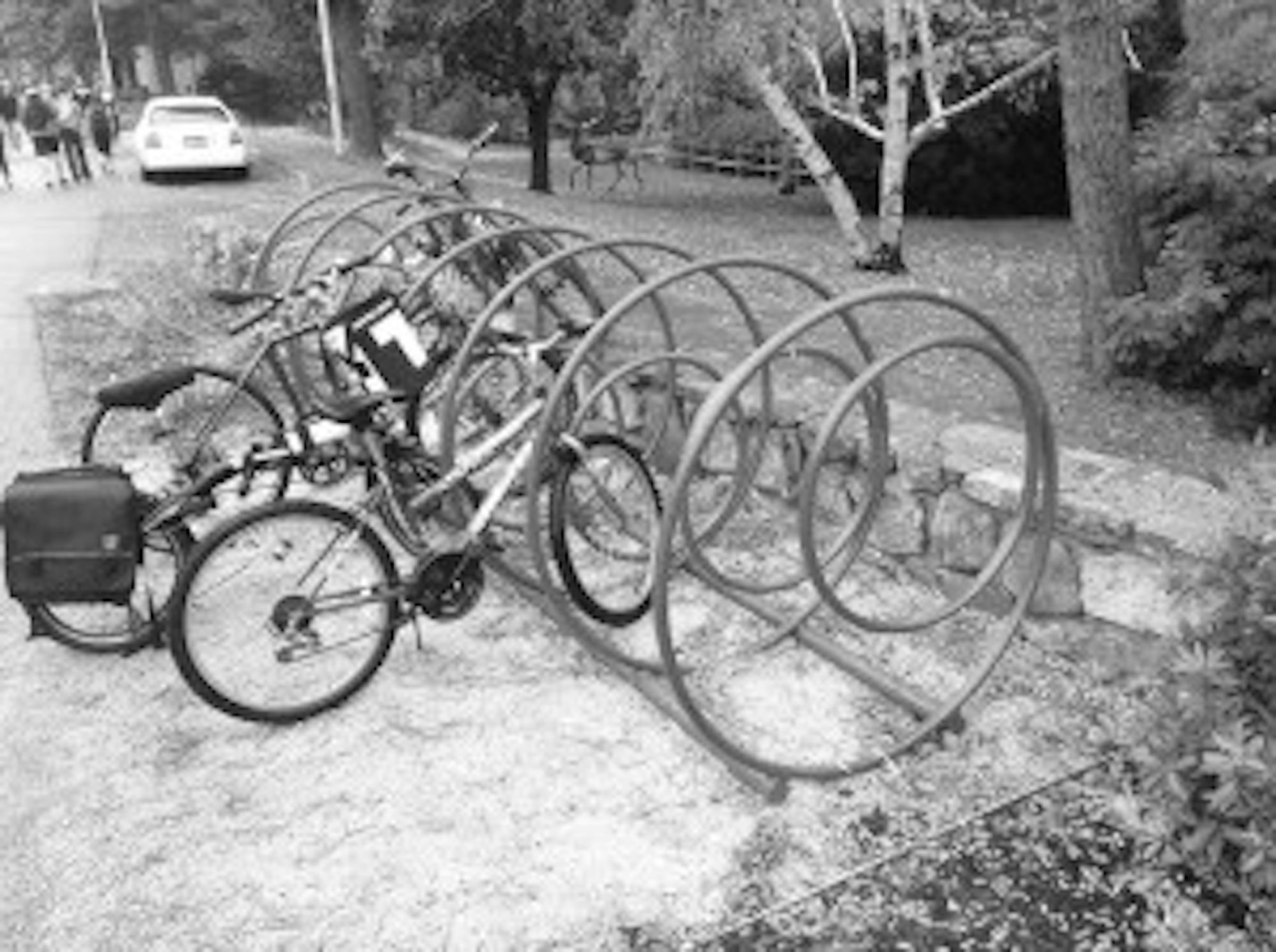 Cam Tranchemontagne/contributing One of the new bicycle racks, a piece called “Helix”  sits in front of the Paul Creative Arts Center. The artist, Rebecca Emerson-Brown, was looking to create something both practical and aesthetically pleasing.